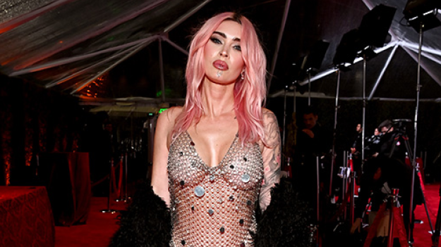 Megan Fox Shines In A Daring Metal Dress At Grammys Party - SurgeZirc