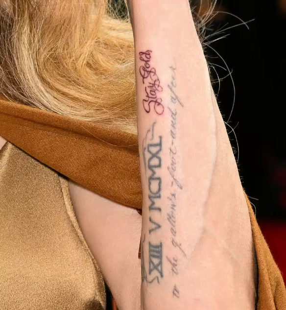 Angelina Jolie Debuts Sentimental New Tattoo At Opening Night - SurgeZirc